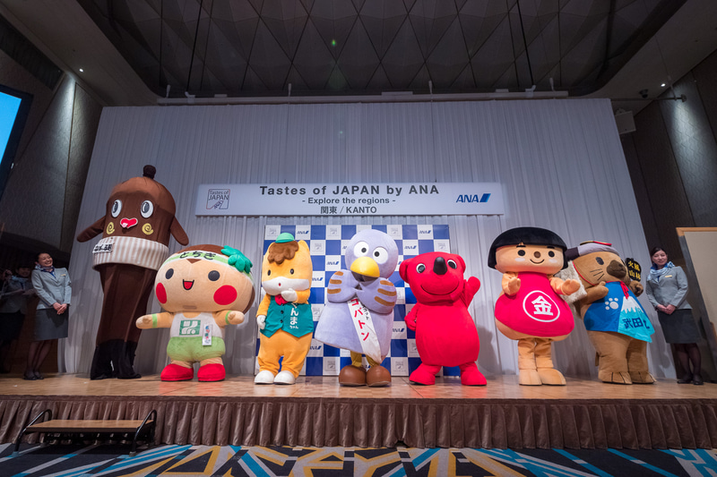 発表会に集まった各県のマスコットキャラクター。左からねば～る君（茨城県）、とちまるくん（栃木県）、ぐんまちゃん（群馬県）、コバトン（埼玉県）、チーバくん（千葉県）、かながわキンタロウ（神奈川県）、武田菱丸（山梨県）