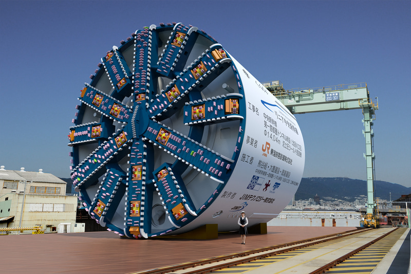 カッターヘッドは新幹線をイメージする青、その後ろの円筒がシールド（CG提供：JR東海）