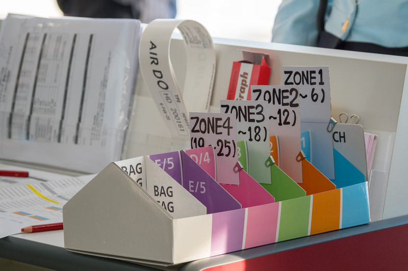 “もぎった搭乗券”をゾーンごとに管理