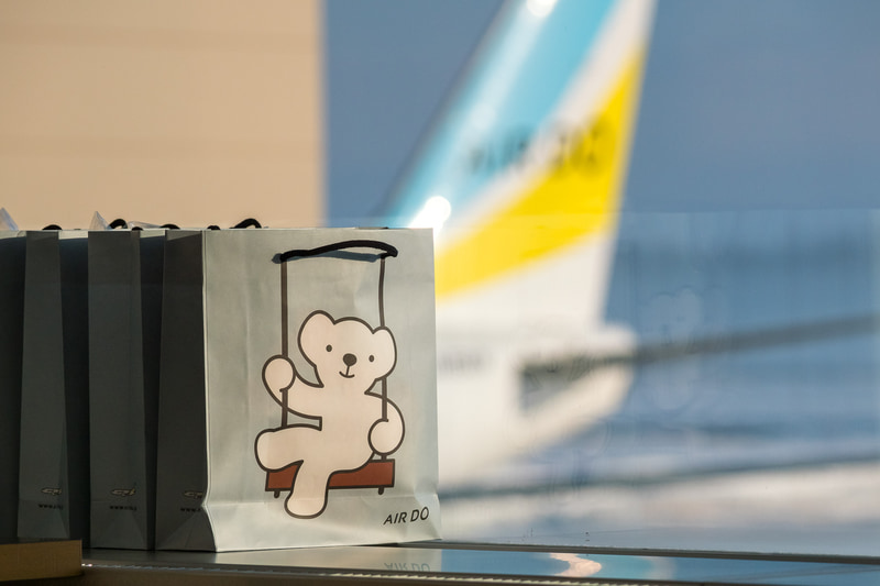 乗客に配布する記念品