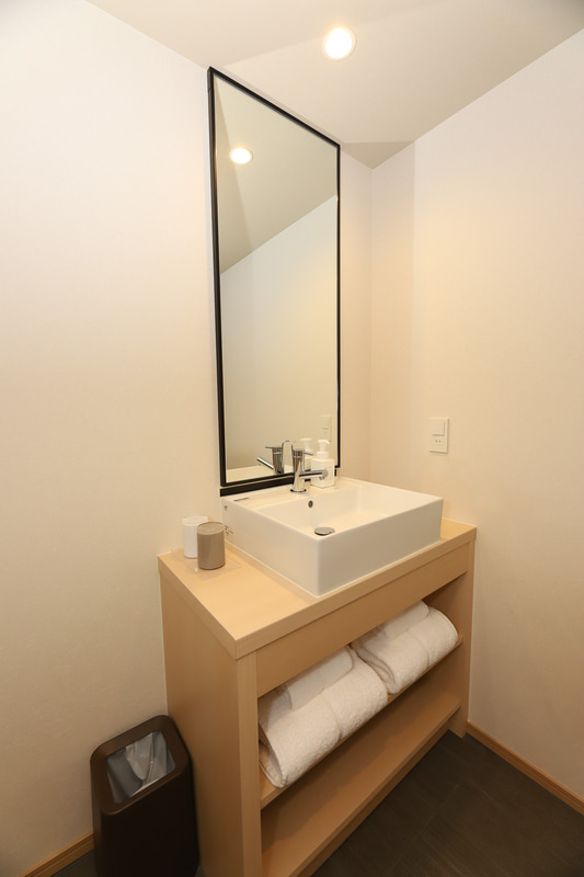 洗面、トイレ、バスルームもシンプルで使い勝手を優先している