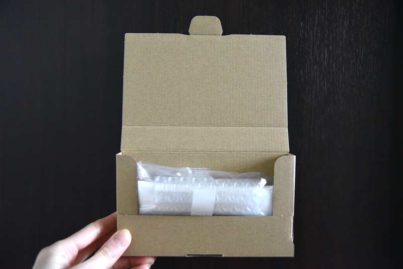 返送用BOXを組み立て、なかに入れる