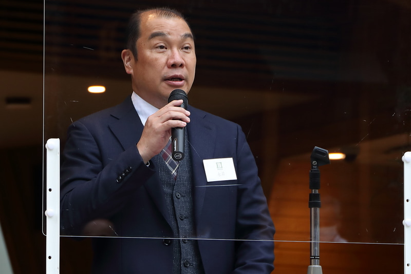 事業戦略について発表を行なった株式会社アールシーコア 専務取締役 永井聖悟氏