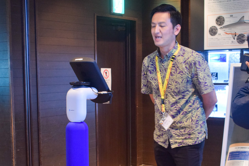 サービス開始第1号の一般ユーザーがアクセス。美ら島財団広報の石川氏があいさつ