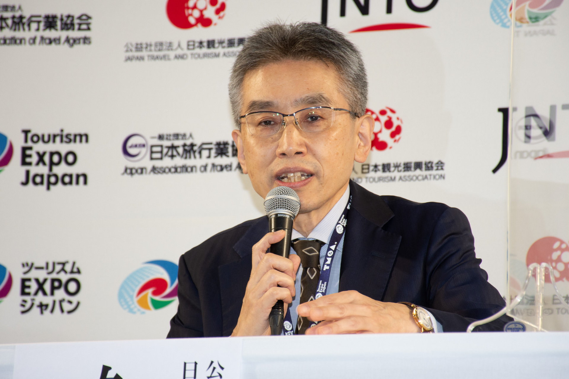 SDGsの取り組みについて説明する公益社団法人日本観光振興協会 理事長 久保田穣氏