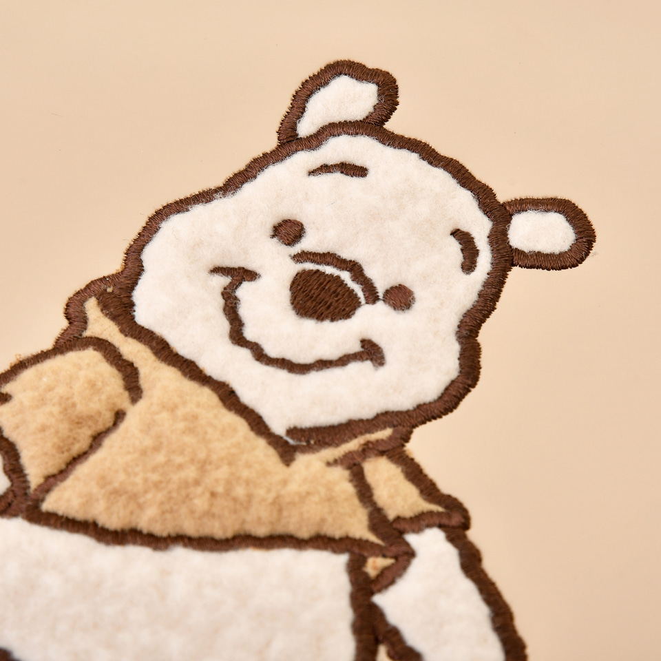 ディズニー、プーさんのモコモコ素材やモカカラーを用いたコレクション