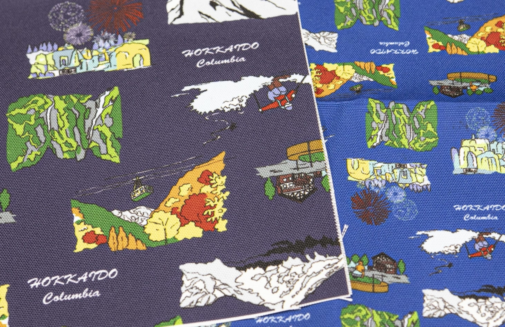 ブルーの生地に、上川町の四季の風物詩をデザイン