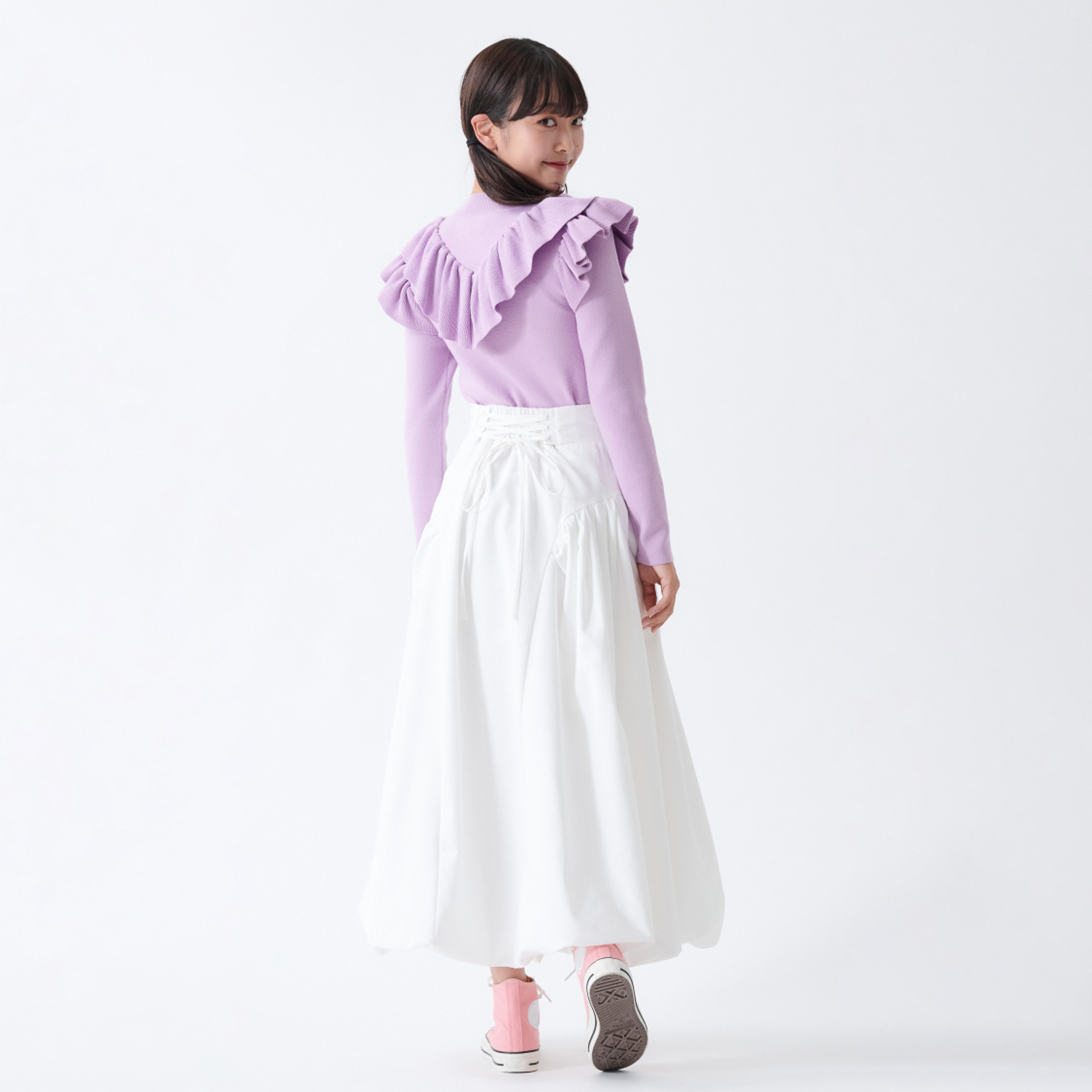 スカートの腰回りは紐で調整。着る人を選ばないのもうれしい