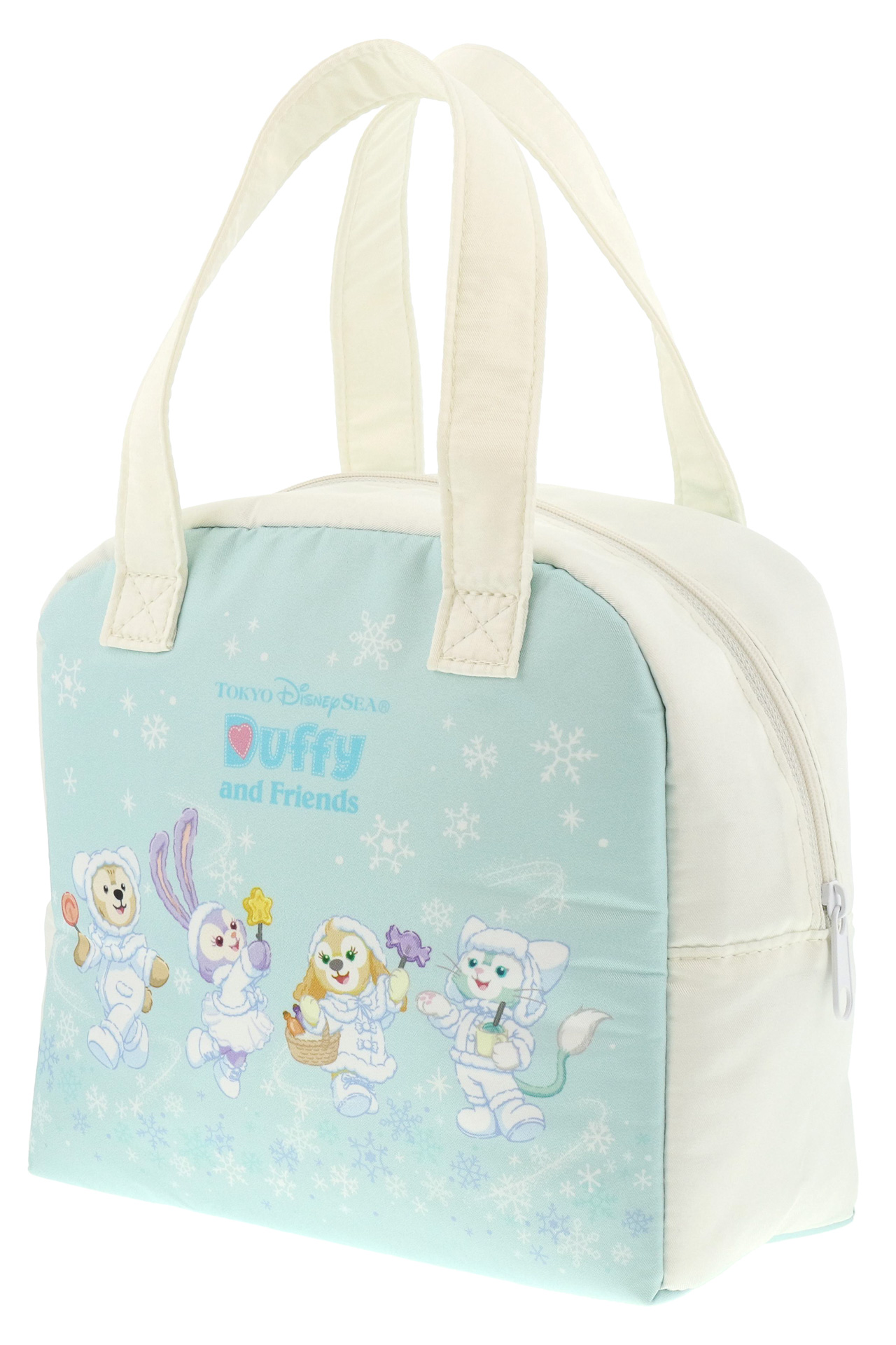 カラフルなキャンディ片手に雪の降る様子を眺める姿がキュート