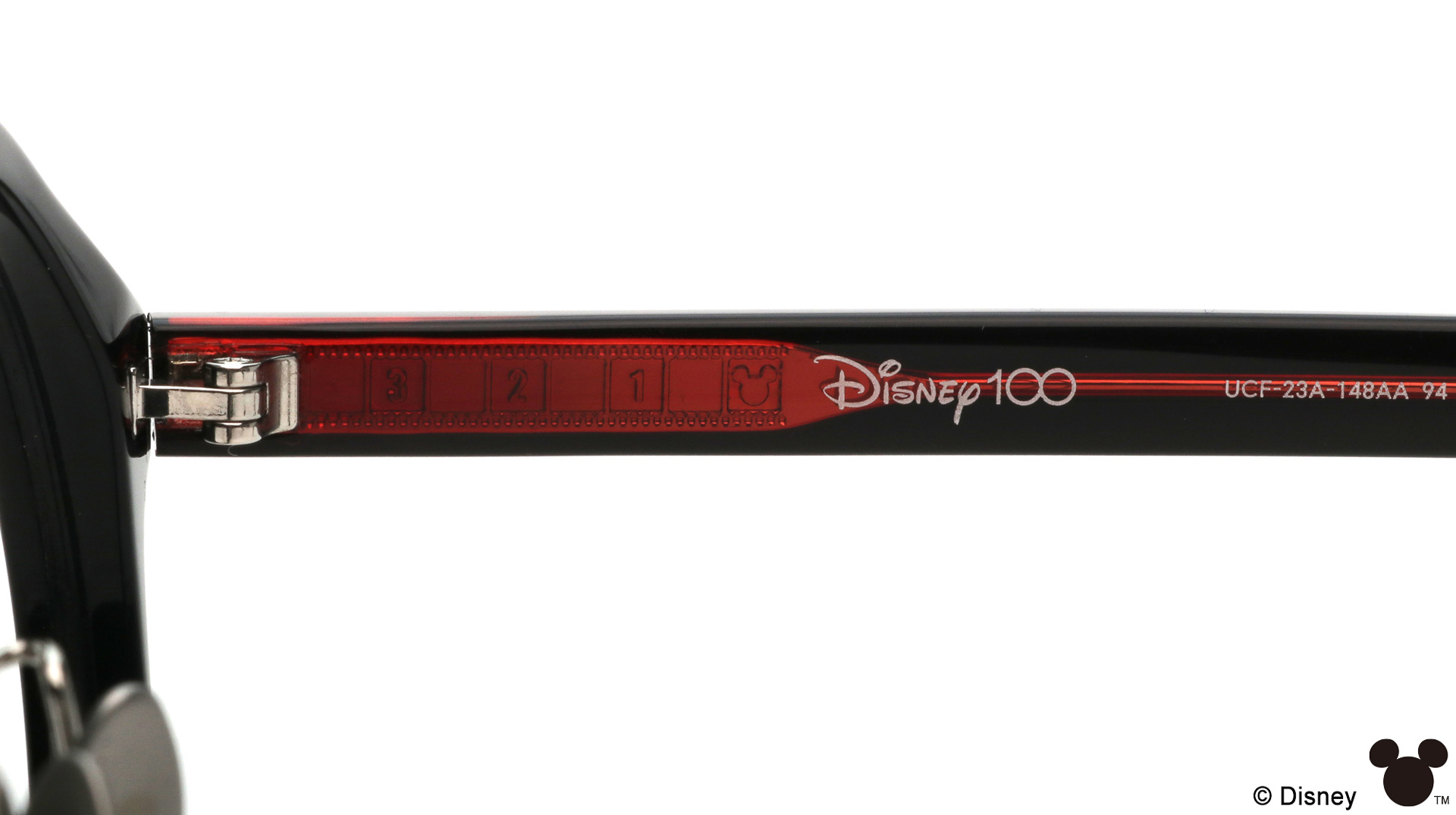 テンプルには映画フィルムをモチーフにした彫金を採用