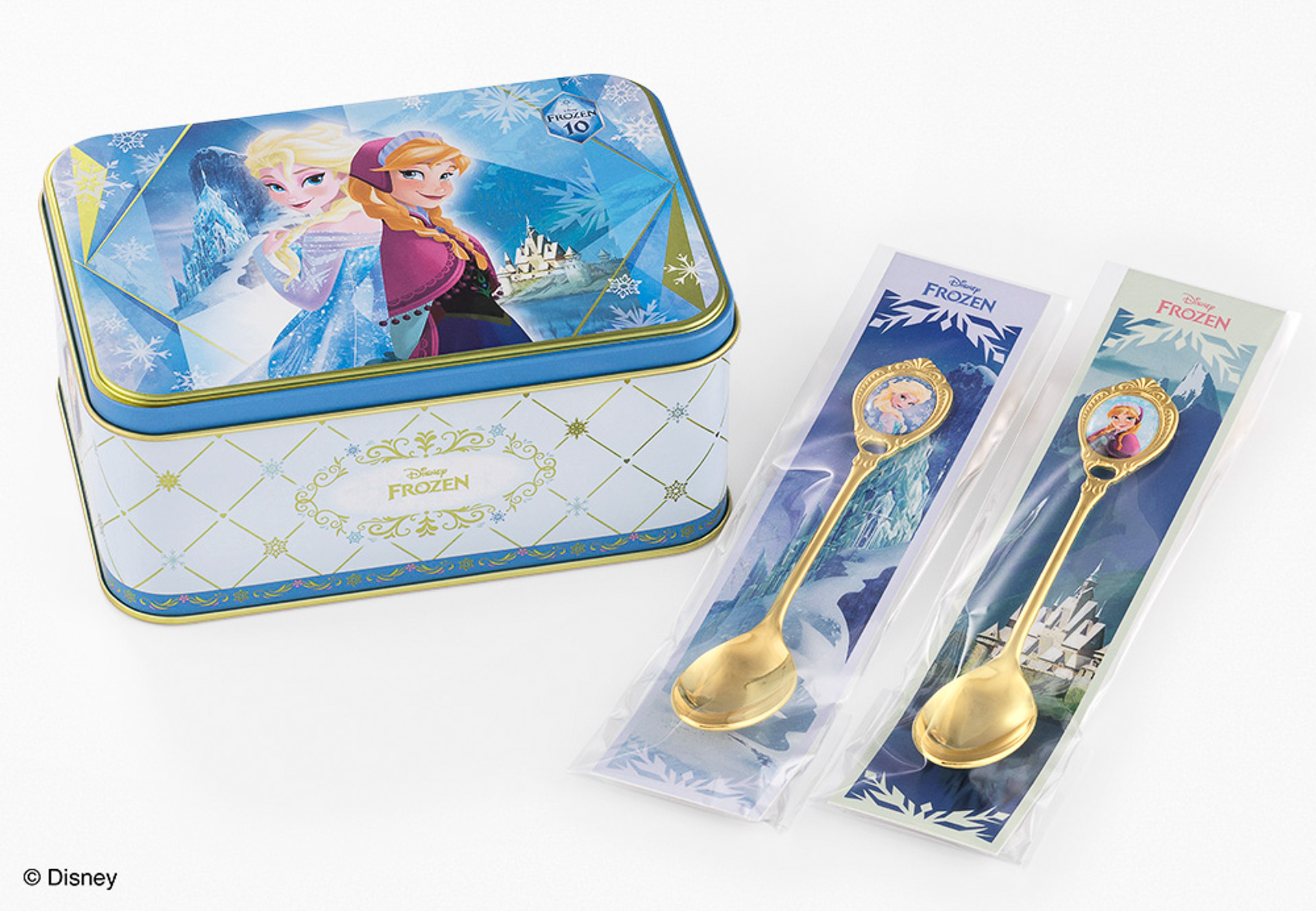 「アナと雪の女王／雪のショコラサンド」（アニバーサリー缶、14枚入りスプーン2本セット3300円）
