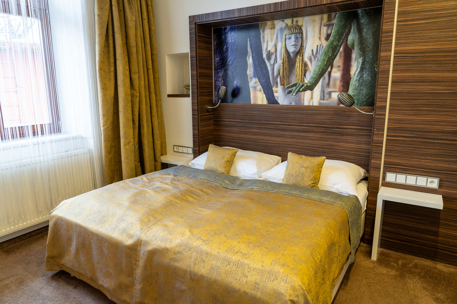 有名な彫刻家をテーマにしたアパートメントタイプの客室