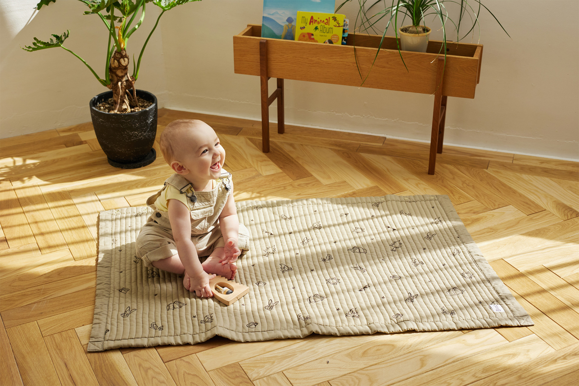 敷物としても使えるキルトケット