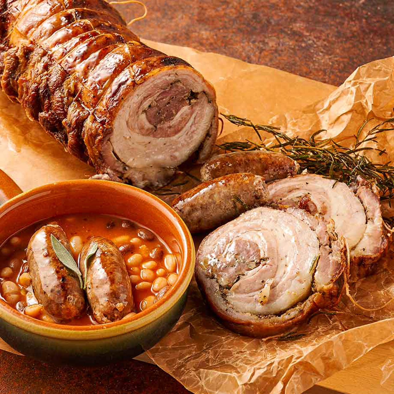 ドン・ジョバンニ「自家製ソーセージとお豆の煮込み（1400円）」「ポルケッタ（750円）」