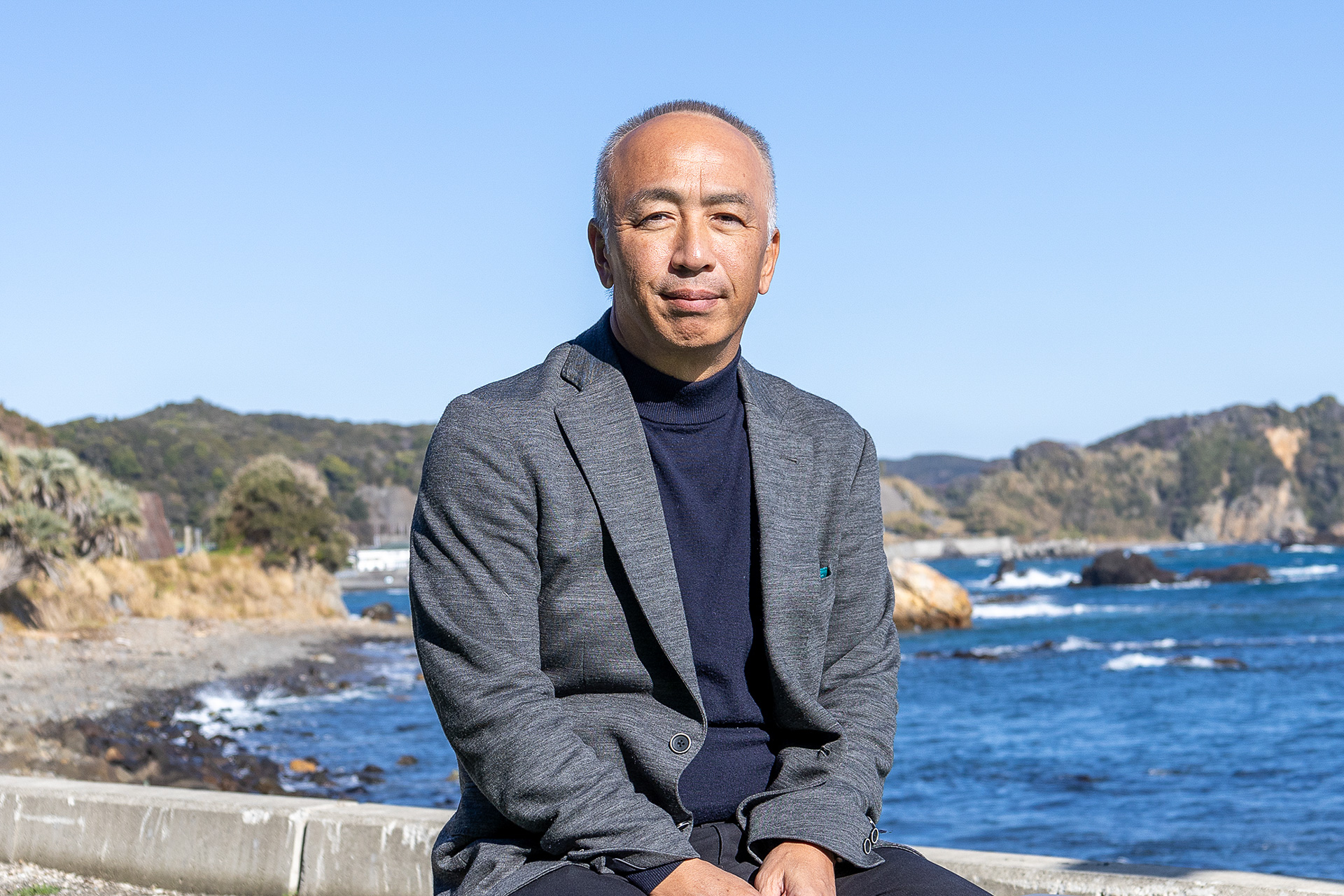 RVパーク 赤穂浦を運営する平山敬一氏。下田に来る車中泊ユーザーが快適な車中泊をするための施設として海沿いの敷地を利用してPVパークを開設