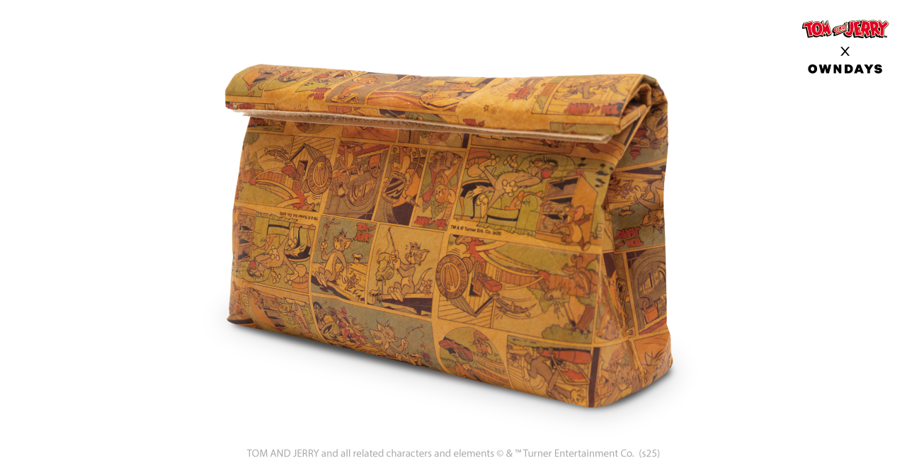 コラボメガネを購入すると付いてくる「コミック柄タイベックケース」は軽量かつ頑丈な素材で、使えば使うほどシワと柔らかさが増して味が出る。「チーズなメガネ拭き」もトムジェリらしさ満点！