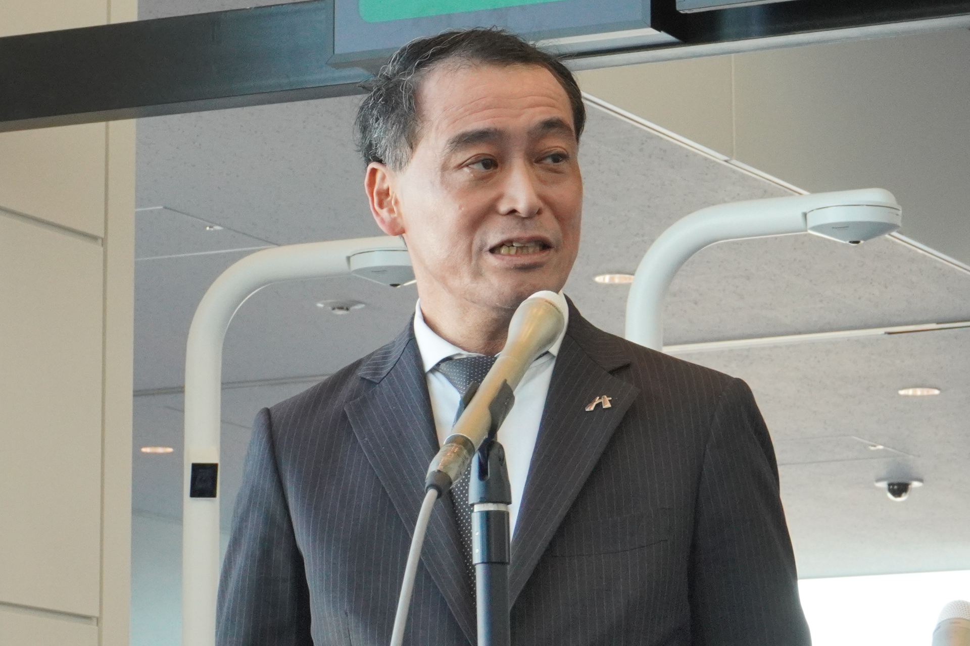 供用開始について説明を行なった日本空港ビルデング株式会社 旅客ターミナル運営本部 施設管理グループ 執行役員 髙橋将氏