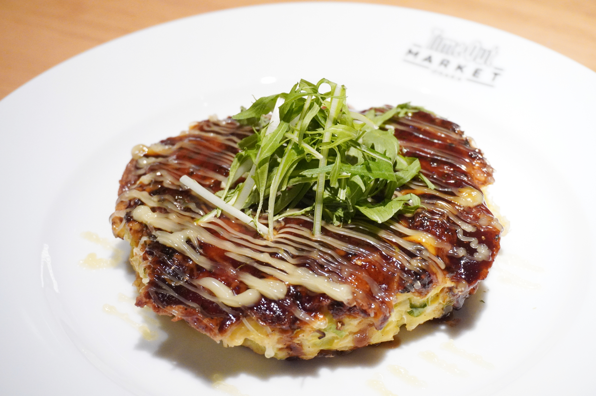 「黒豚バラ肉玉お好み焼き」（1200円）