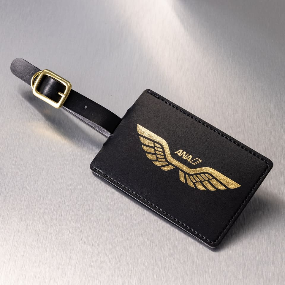 ANA、パイロット制服イメージしたボストンバッグ/ガジェットポーチ