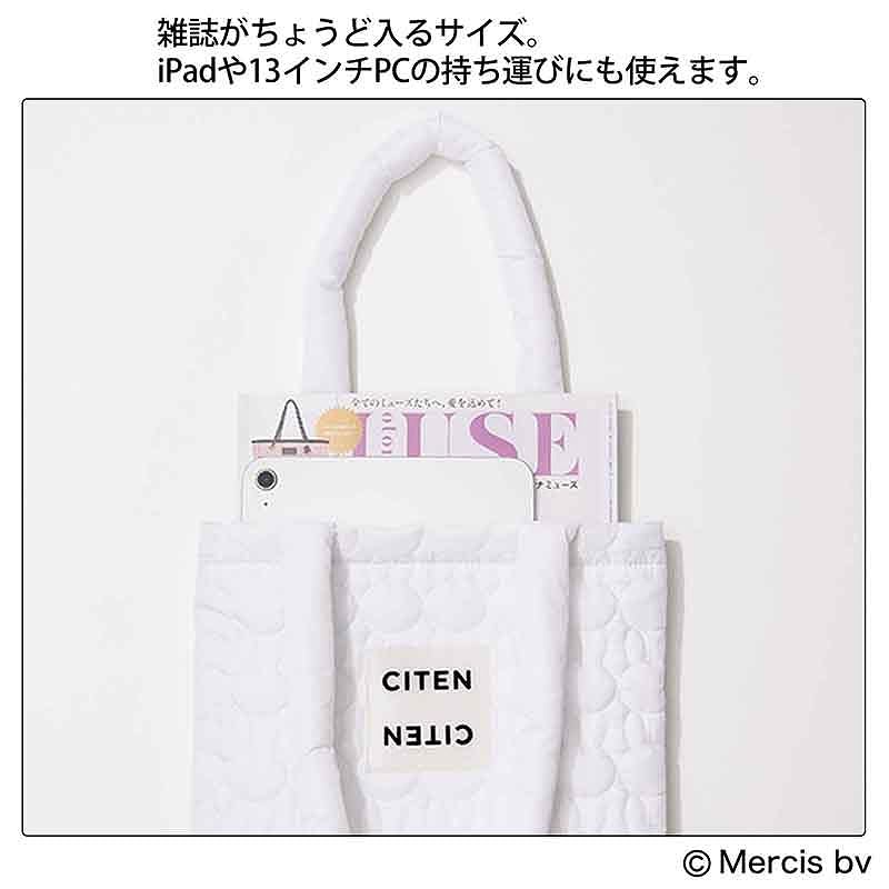 A4書類や13インチPCがすっぽり収まるサイズ。ひょっこりのぞきこむミッフィーのタグがアクセント