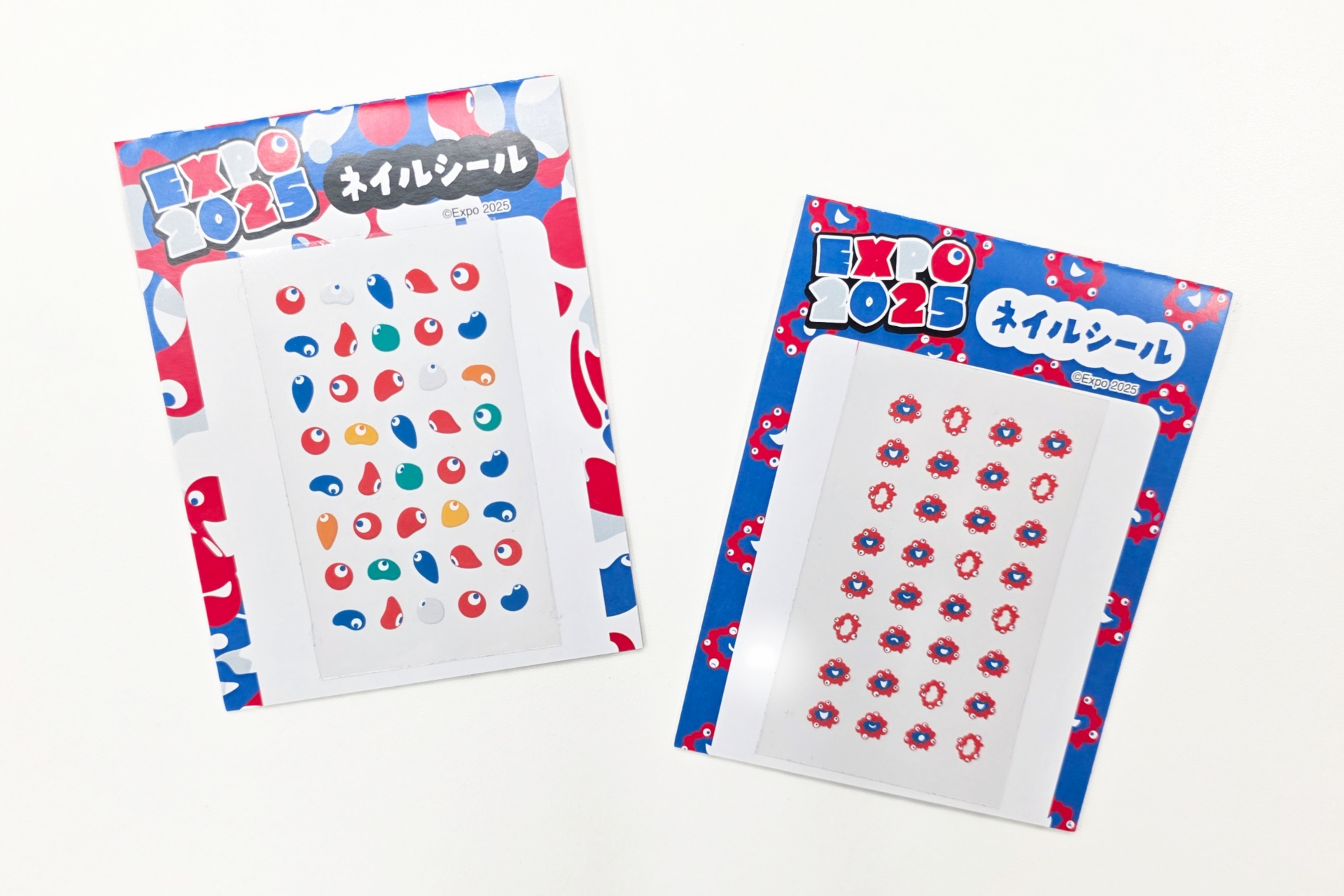 指先から万博気分を楽しめる「EXPO2025 ネイルシール」（各550円、8月中旬発売予定）