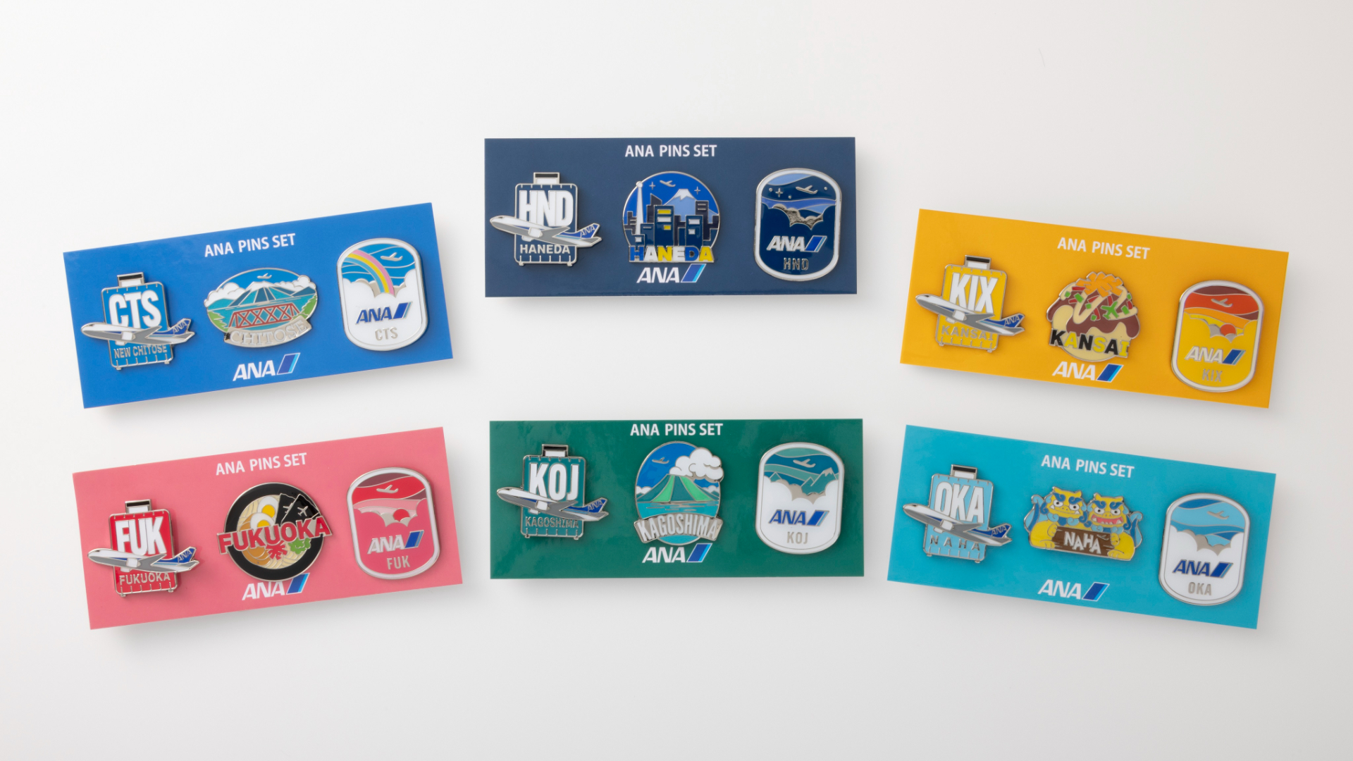 各空港ごと3レターコードと地域の名所・名物をモチーフにした「ANAピンズセット」発売