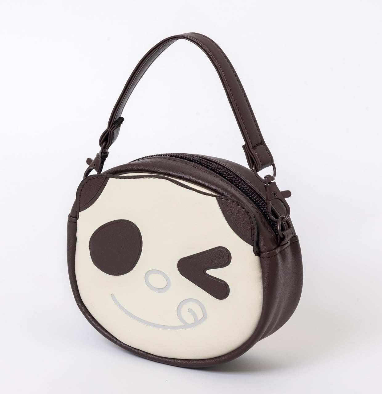 付属のハンドルを取り付ければ、かわいいミニバッグとしても使える