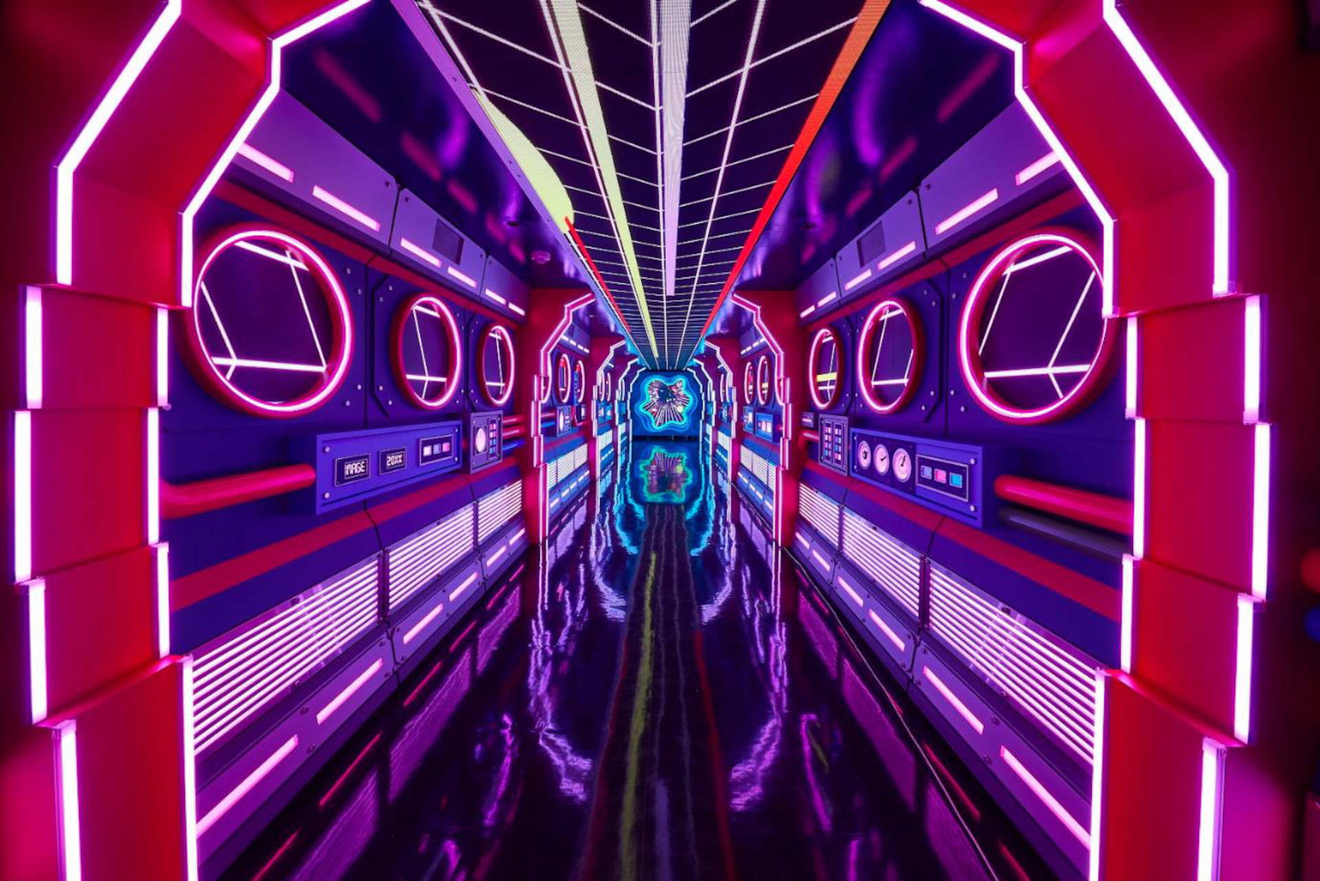 The interior of Car No. 1, "FUTURE BIRD." A decommissioned Thunderbird train has been upcycled into an immersive experience area.