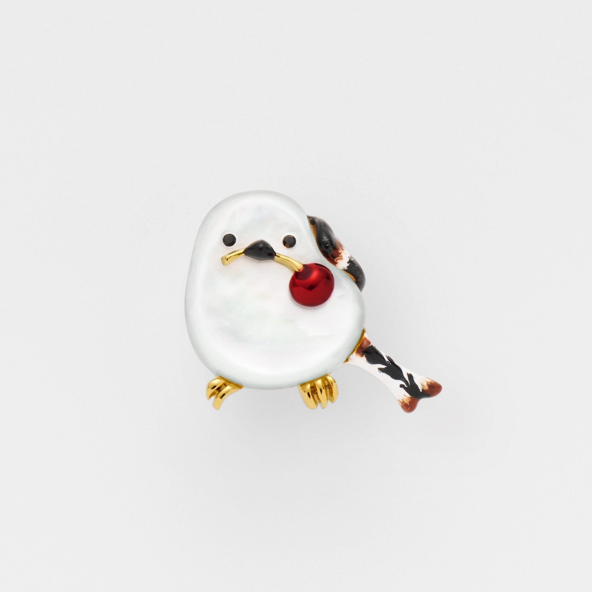 ブローチ・ポーチセット（2万3100円）。ポーチはサークル型