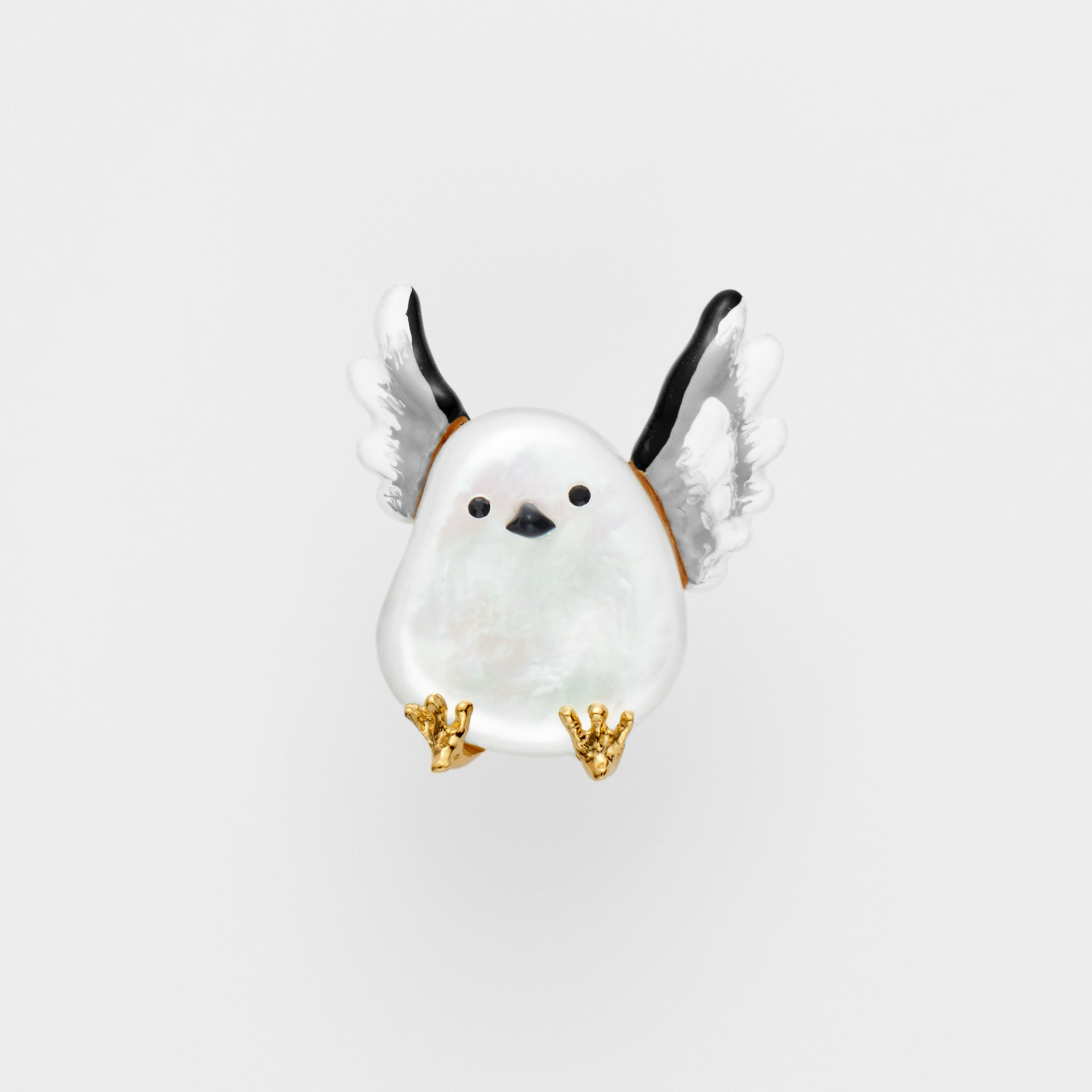 ブローチ・ポーチセット（3万800円）。ポーチはサークル型