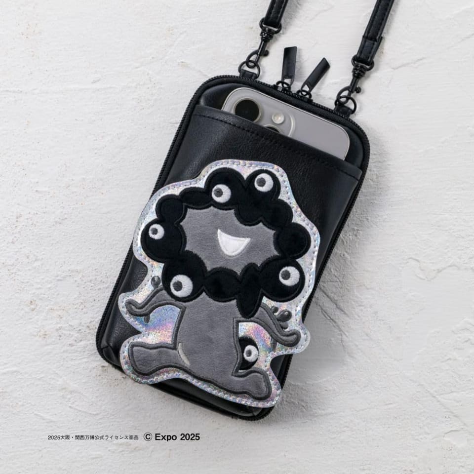 黒ミャクミャク」スマホポシェットが12月に発売！ 予約注文スタート