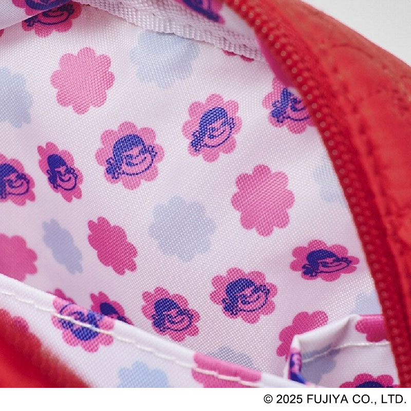 裏地はミルキーの包み紙の総柄で、ガバッと開くじゃばら式