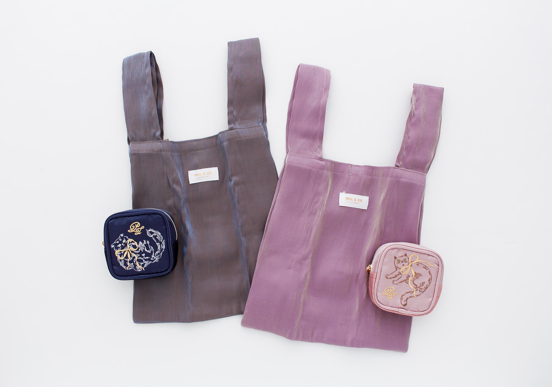 「PAUL＆JOE ACCESSOIRES ポーチ付きエコバッグ」（各5500円）。カラーはネイビー（ジプシー）とピンク（ヌネット）の2色で、バッグは約29×27×12cm、ポーチは約10×10×3.5cm