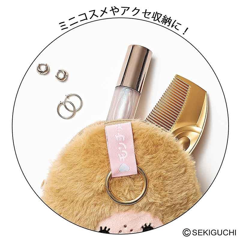 モンチッチポーチを手持ちのバッグに取り付けるとこんな感じ。ミニコスメやアクセを収納できるサイズ感