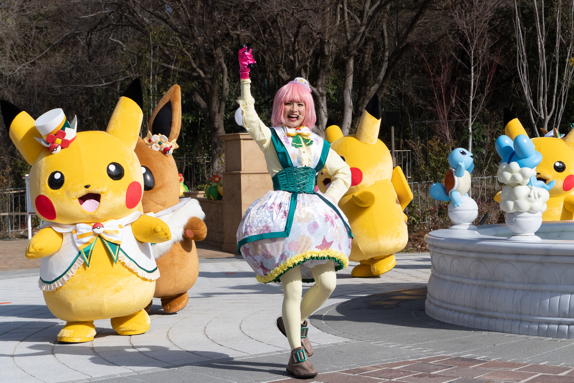A massive group of Pikachu and Eevee toddles towards the crowd!
