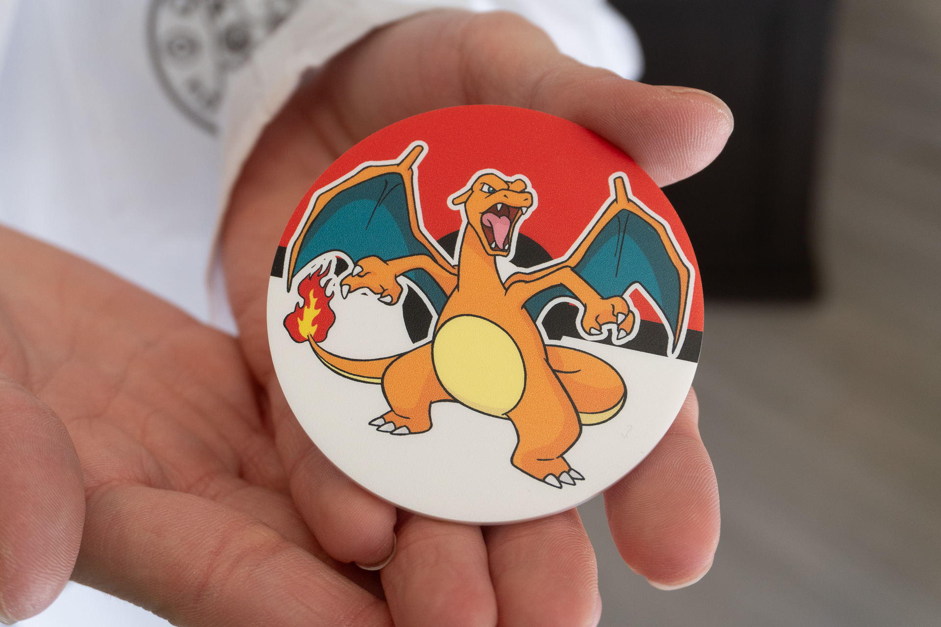 Each researcher wears a uniquely designed badge.