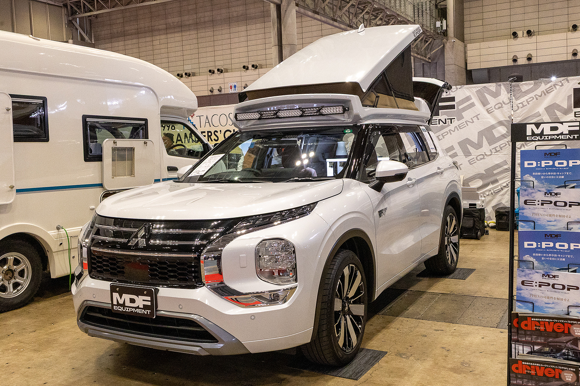 西尾三菱自動車販売が使うアウトランダーPHEVベースの「イーポップ」。車外にテーブルやチェアを展開できるようなオートキャンプ場やRVパークとの相性は特によさそうだ
