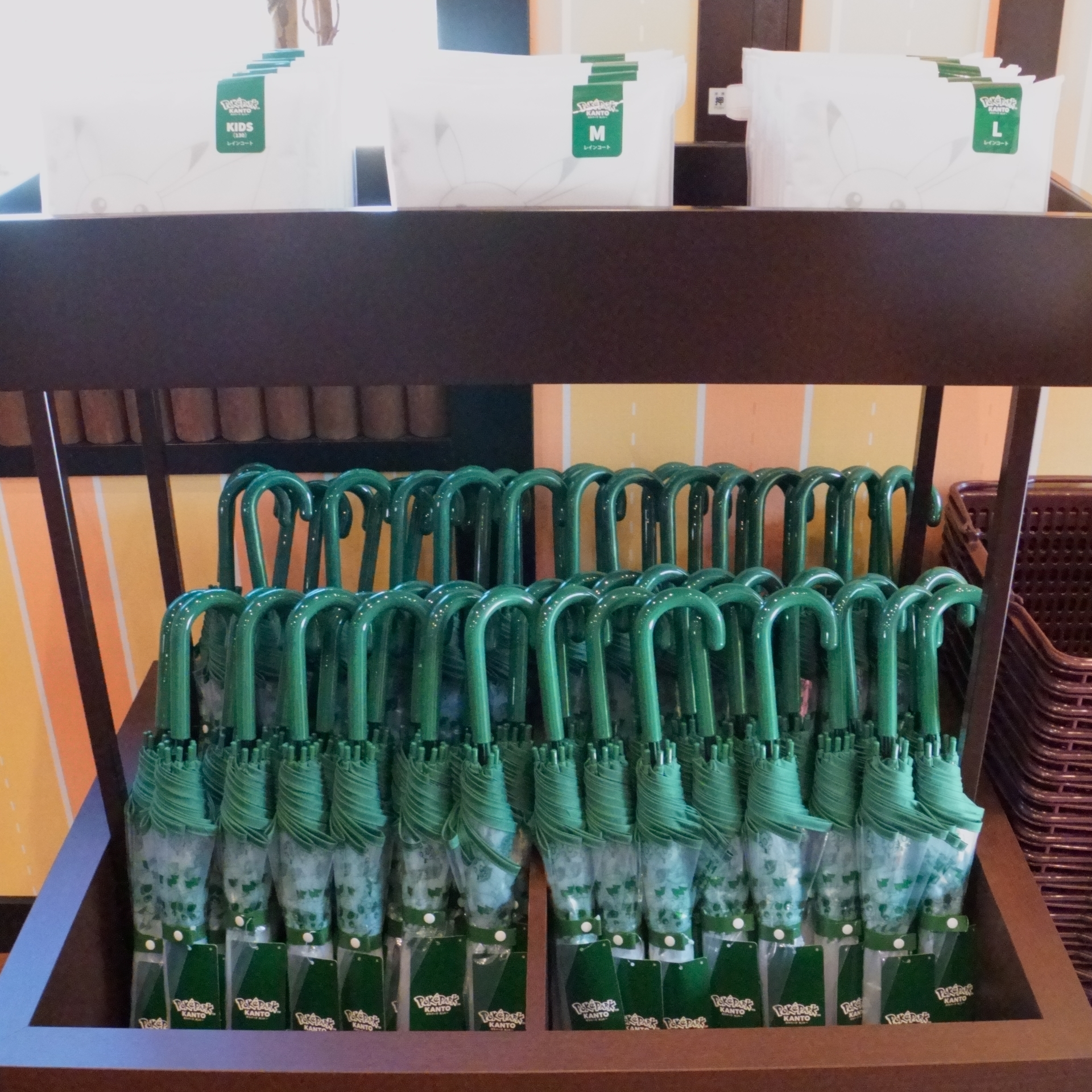 Umbrellas and raincoats sold at the Pokémon Daisuki Shop.