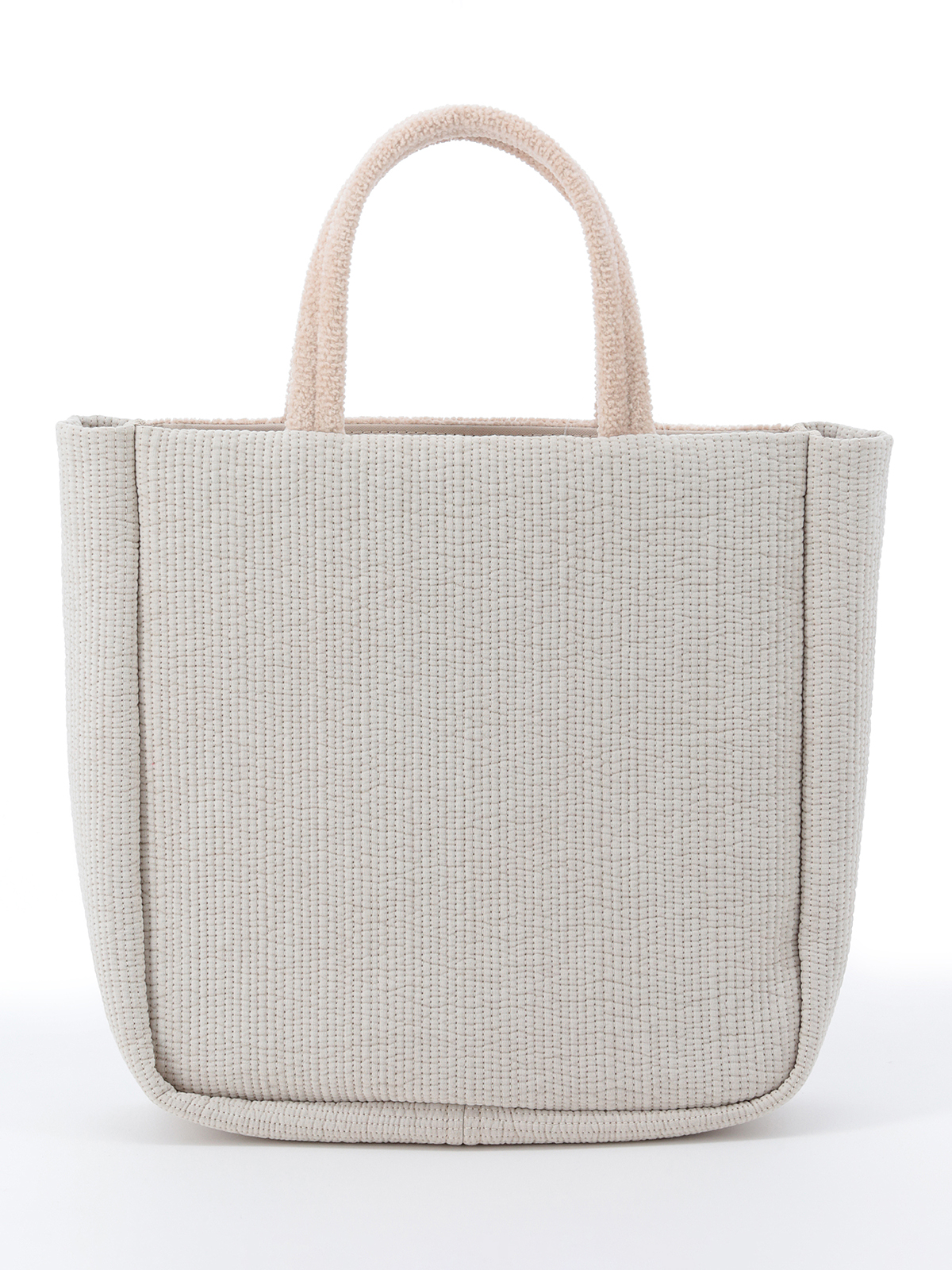 オリジナルバッグの表と裏。裏面には3mmヌビ生地を使用