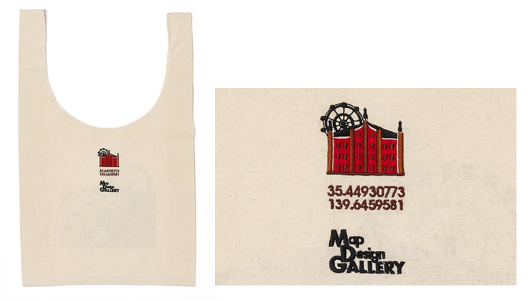 マルシェバッグ（2640円）。表は横浜港を中心とする地図と観覧車、裏は横浜赤レンガ倉庫と緯度・経度をデザイン