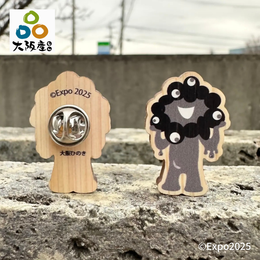 大阪府産ひのき木製バッチに「黒ミャクミャク」バージョン登場