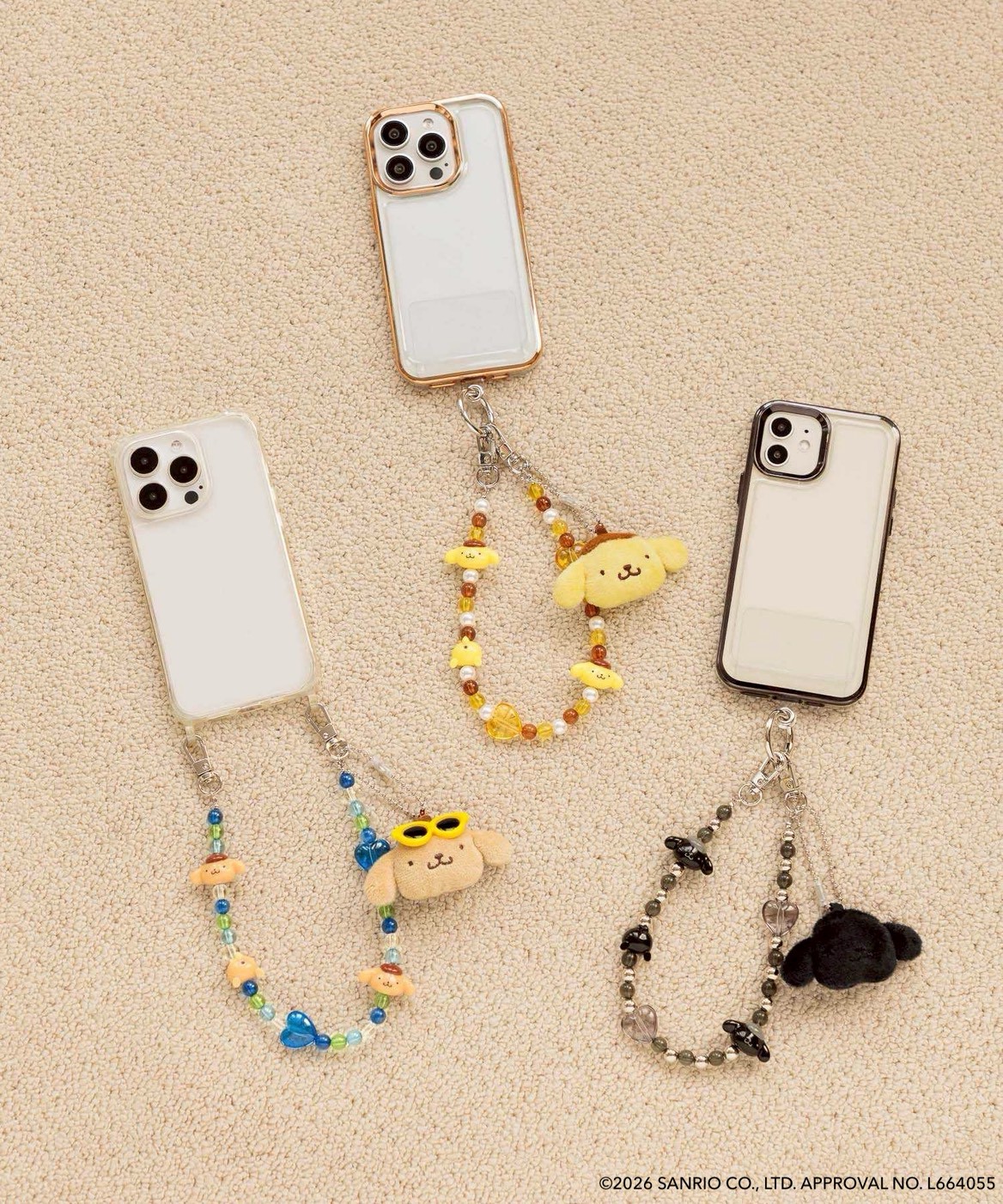 フェイスキーチャーム付きハンドルストラップ（各2890円）。スタンダード、日焼け、ブラック