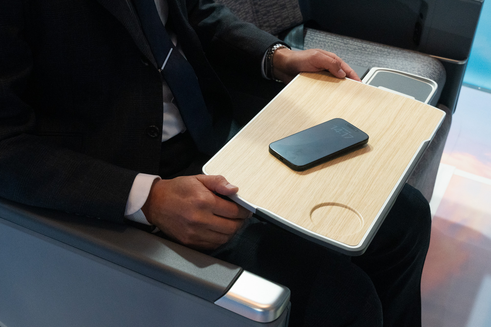 The table can be pulled closer to the passenger.
