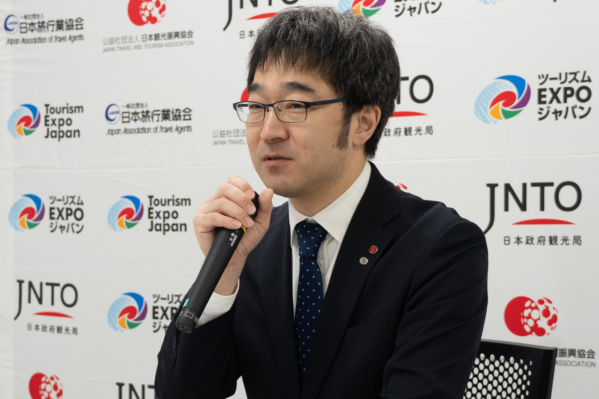 ジャパン・ツーリズム・アワードについて説明する公益社団法人日本観光振興協会 担当部長 町田光朗氏