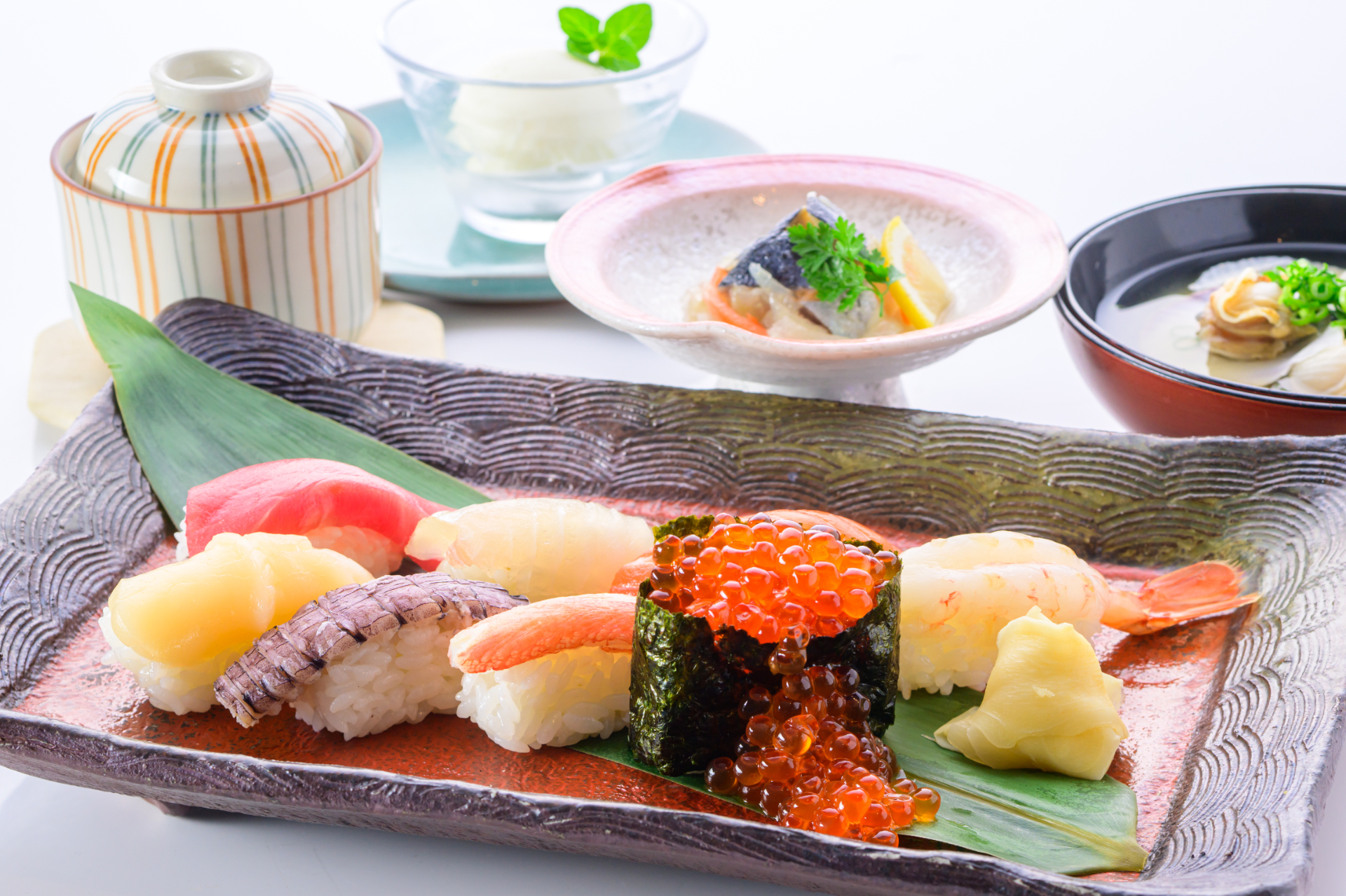 「お気軽なツーリスト船室プラン」。船室はツーリストAの相部屋、ホテル客室はダブル、ホテル夕食は「おたる寿司会席」