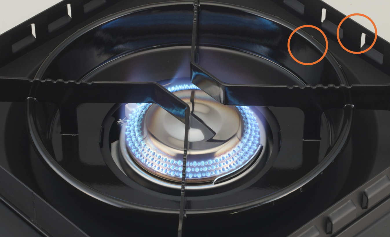 特許取得の遮風構造「ダブル風防ユニット」（丸印）と炎が消えにくい「多孔式バーナー」