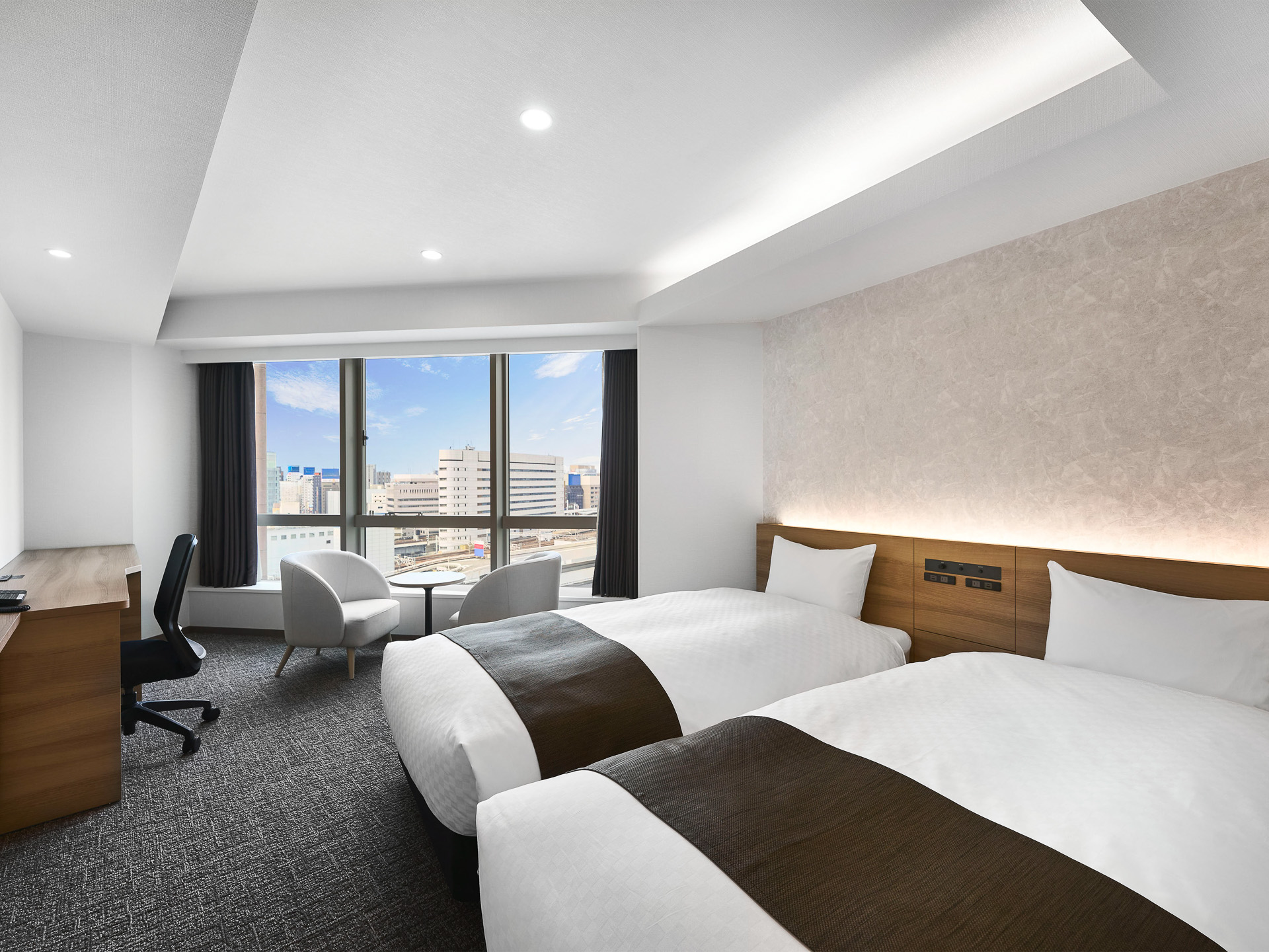 「ダイワロイネットホテル名古屋駅前」が開業。画像は新設のデラックスコーナーツイン