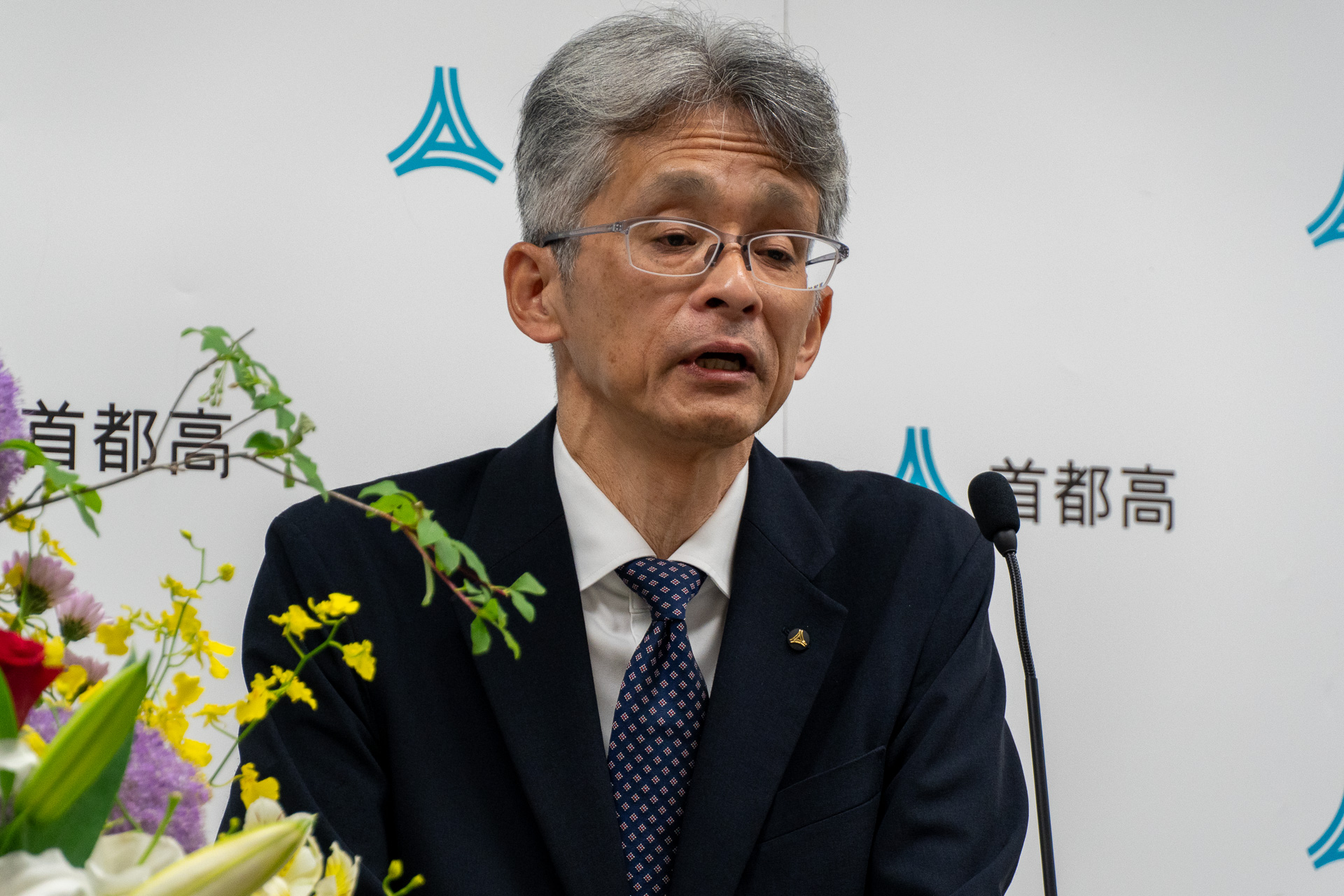 首都高新社長の青木由行氏が会見