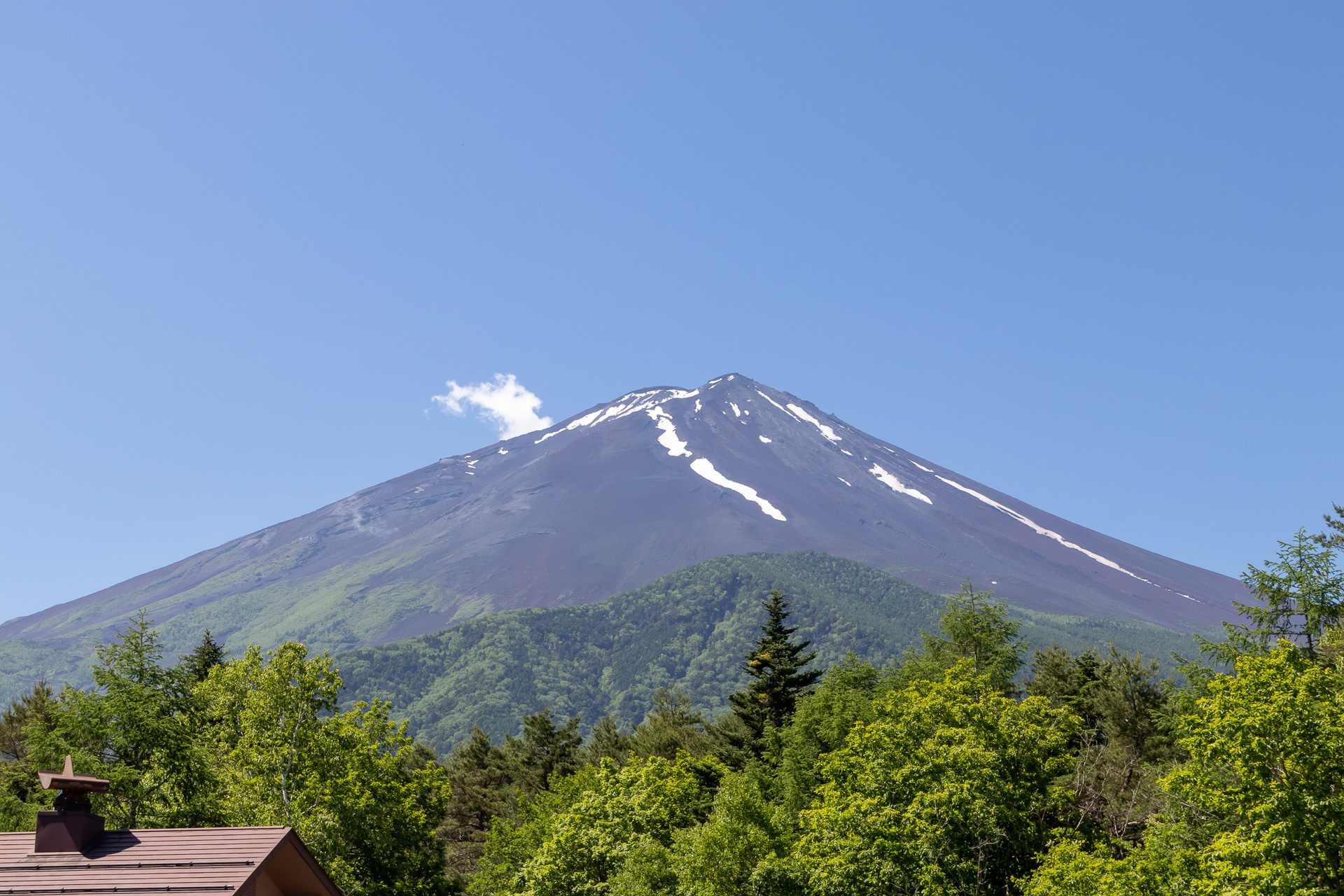 The gate at the Yoshida Trailhead. During the season, guards are stationed 24/7 to manage and regulate access. (Photo from the gate's installation in June 2024)