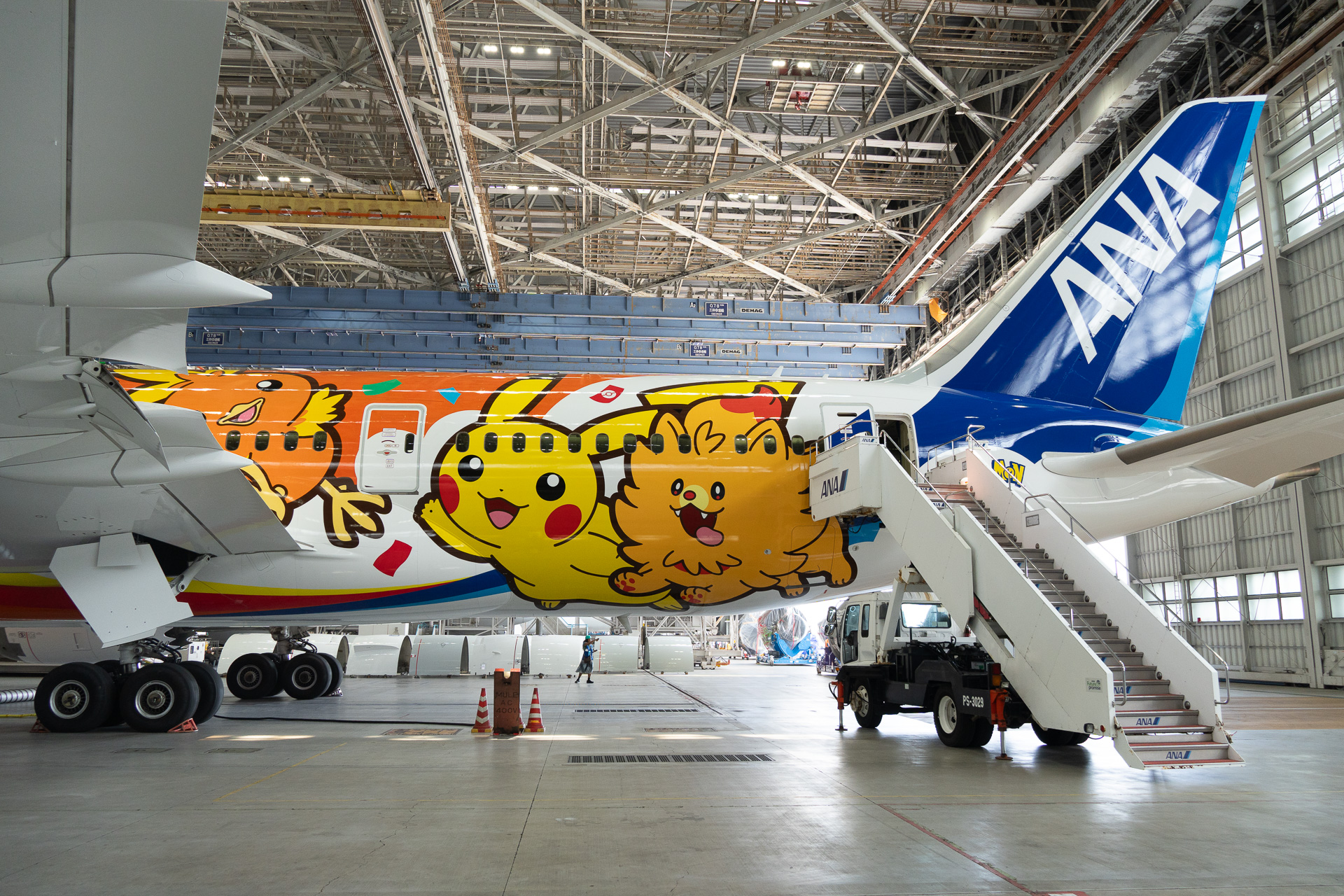 Pomuken, from the new Wind/Wave games, makes an early appearance on the rear left side of the fuselage.